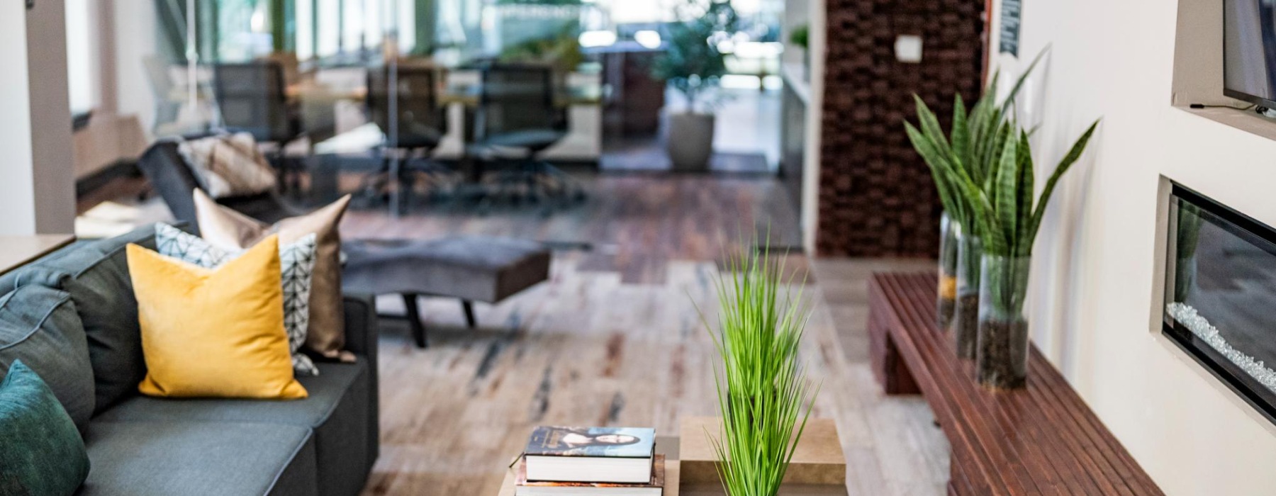 Resident lounge with fireplace and seating area