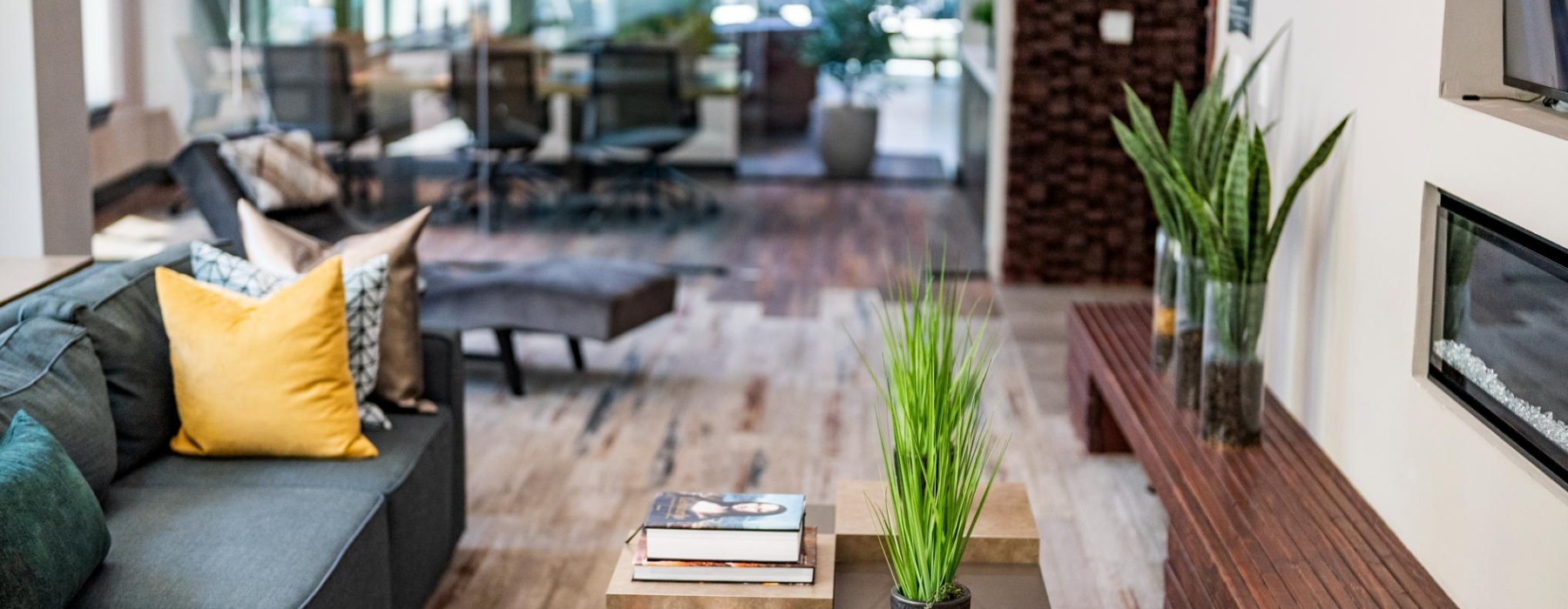 Resident lounge with fireplace and seating area